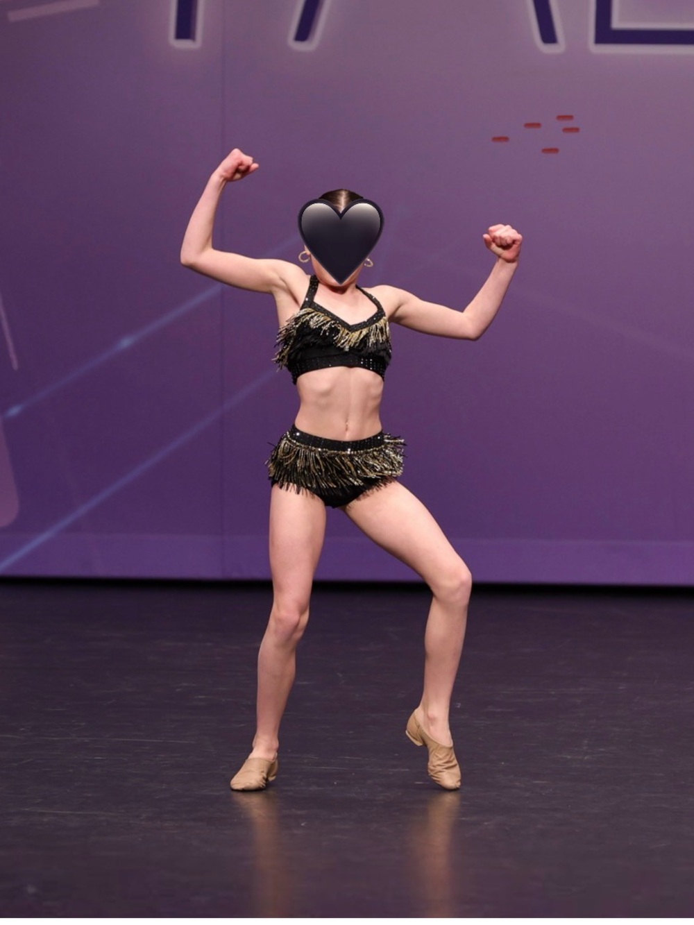 Custom black and gold fringe costume